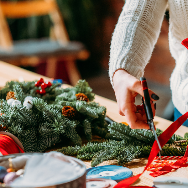Woman making Christmas wreath